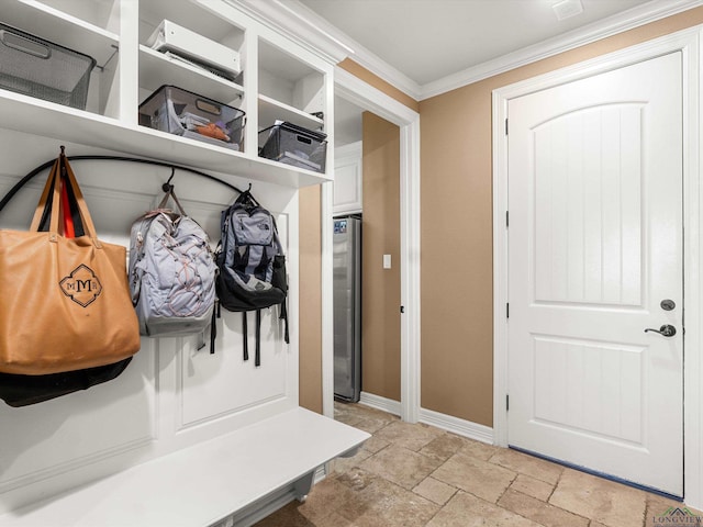 mudroom with crown molding and a wall unit AC