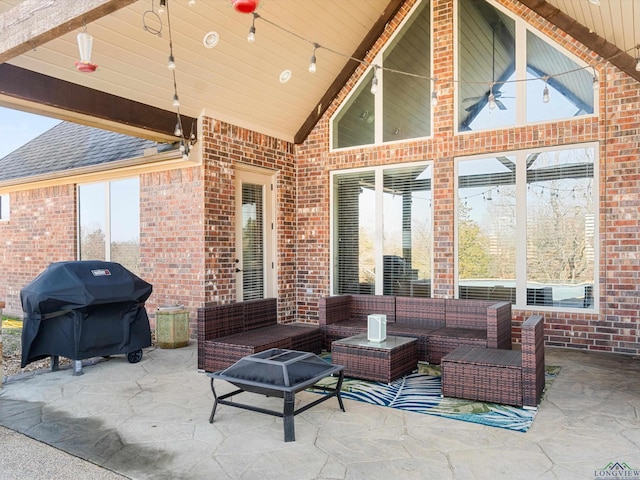 view of patio featuring ceiling fan, a grill, and an outdoor hangout area