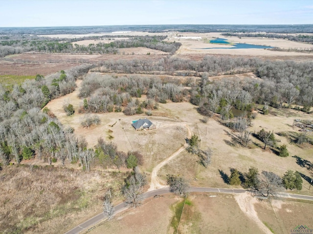 birds eye view of property with a rural view