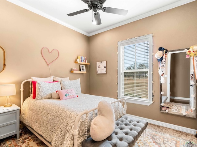 bedroom featuring ornamental molding and ceiling fan