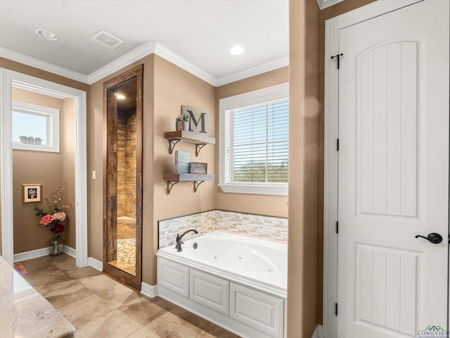 bathroom featuring a bathing tub and crown molding