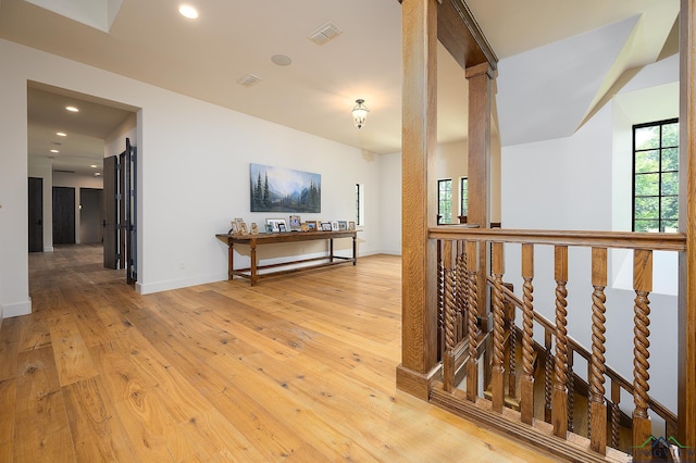 hall featuring light hardwood / wood-style floors