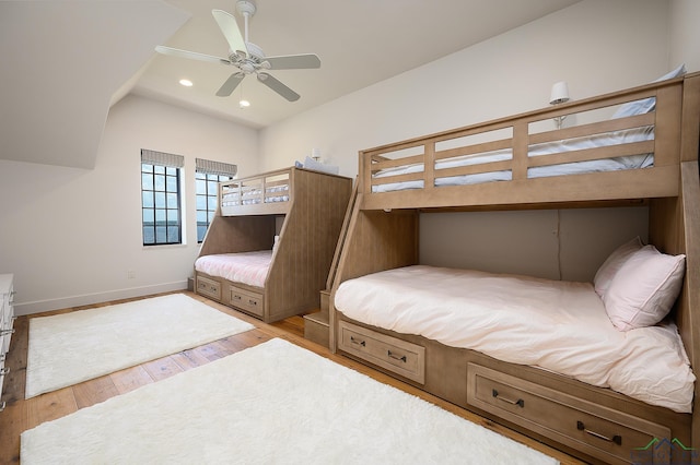 bedroom featuring ceiling fan and light hardwood / wood-style floors