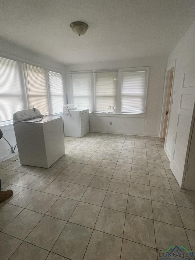 804 High St, Marshall, TX 75670 - unfurnished sunroom featuring washer and clothes dryer