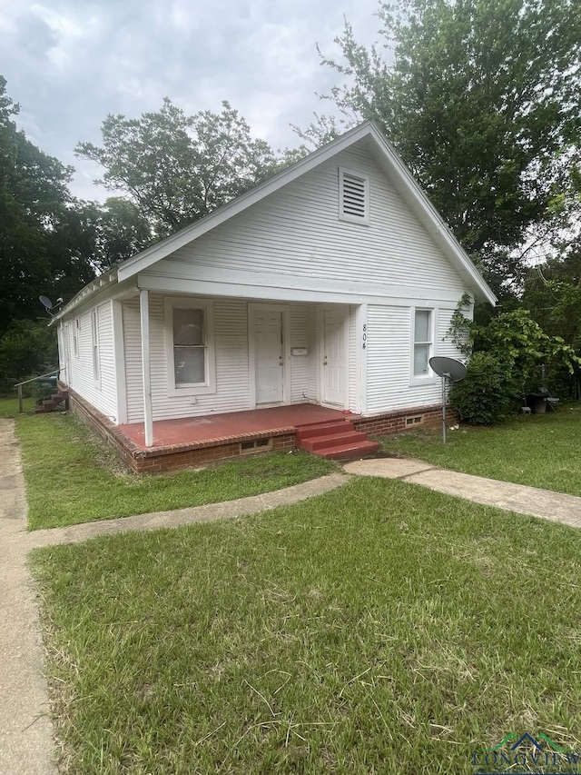 804 High St, Marshall, TX 75670 - bungalow-style home featuring covered porch and a front yard