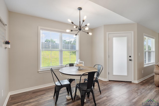 144 Brenlind Ln, Mineola, TX 75773 - dining space featuring wood finished floors and a chandelier