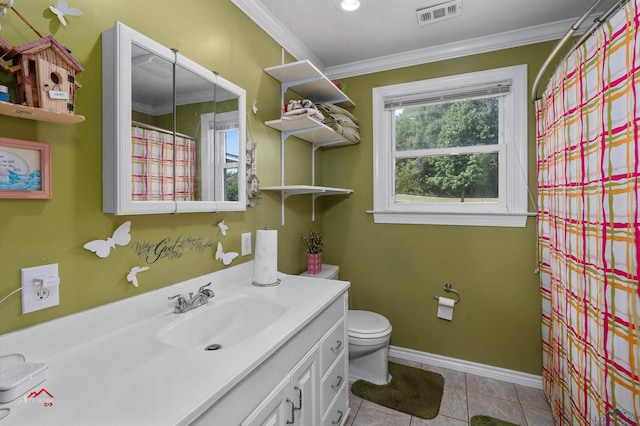 bathroom featuring tile patterned flooring, vanity, toilet, and ornamental molding