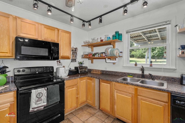 kitchen with black appliances, sink, ornamental molding, light tile patterned floors, and a textured ceiling