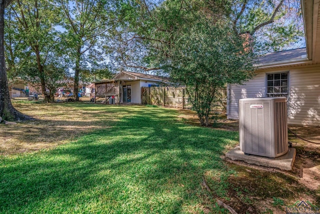 view of yard featuring central AC