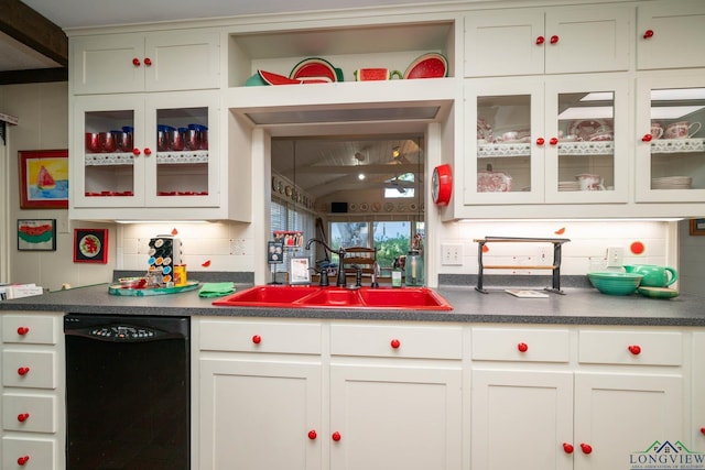 kitchen featuring dishwasher, white cabinetry, sink, and tasteful backsplash