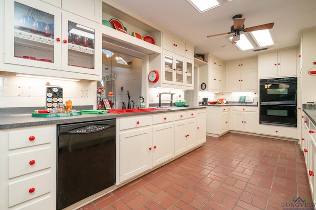 kitchen with white cabinetry, sink, ceiling fan, tasteful backsplash, and black appliances