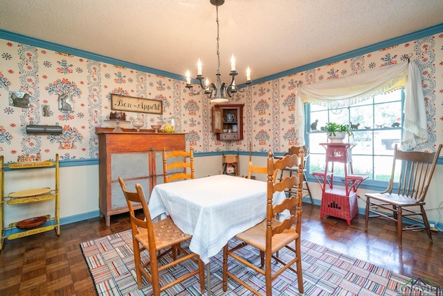 dining room with dark parquet flooring, an inviting chandelier, and ornamental molding