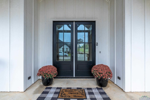 entrance to property featuring french doors