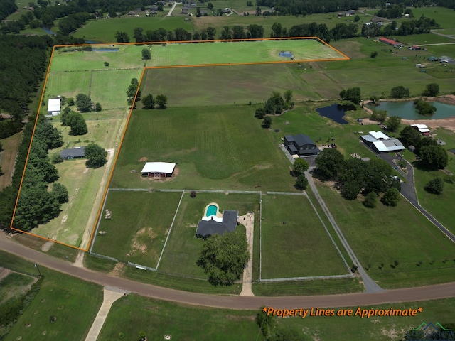 aerial view featuring a rural view and a water view