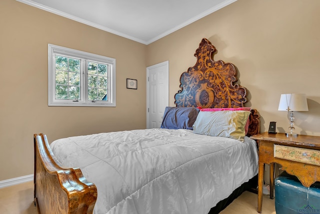 carpeted bedroom featuring crown molding