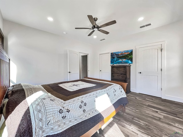 bedroom with hardwood / wood-style flooring and ceiling fan