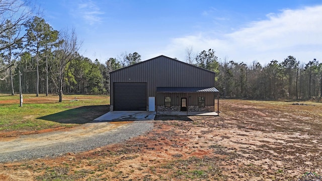 view of outbuilding featuring a garage