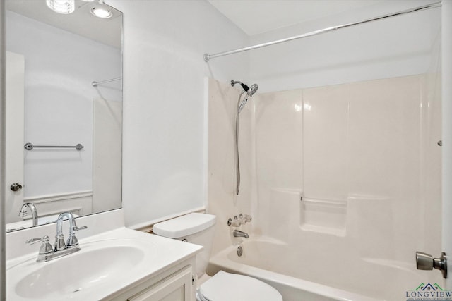 bathroom with shower / bathtub combination, vanity, and toilet