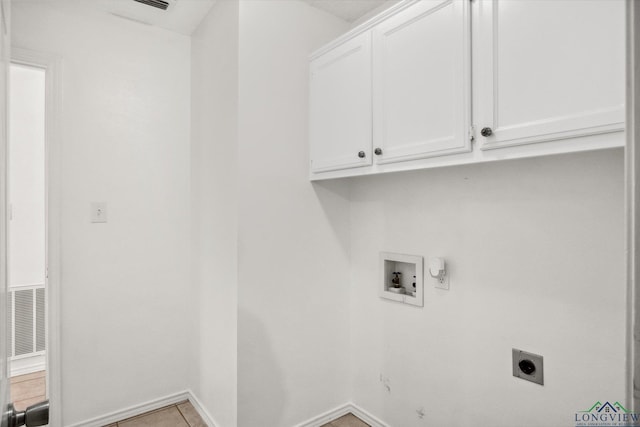 laundry room featuring hookup for a gas dryer, washer hookup, visible vents, cabinet space, and electric dryer hookup