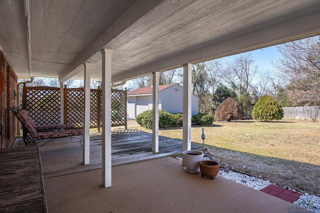 view of patio / terrace featuring fence