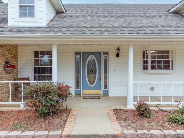 doorway to property with covered porch