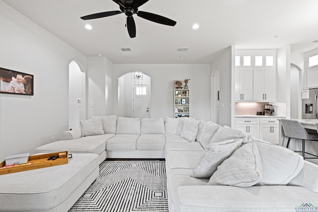 living room featuring ceiling fan