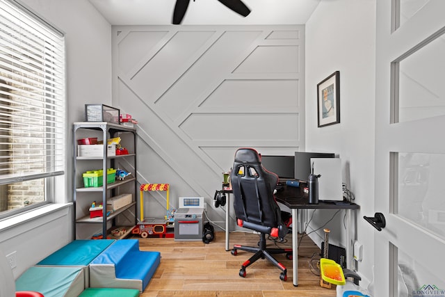 office area featuring ceiling fan and wood-type flooring