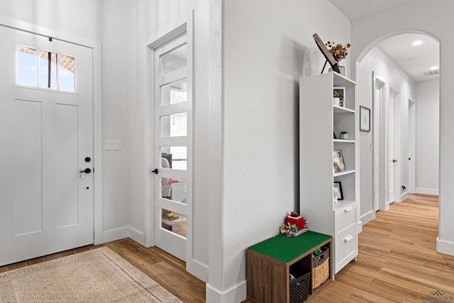 foyer entrance featuring light hardwood / wood-style flooring