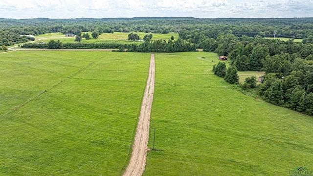 birds eye view of property with a rural view