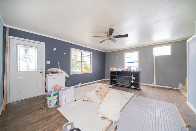 bedroom featuring multiple windows, ceiling fan, crown molding, and dark hardwood / wood-style floors