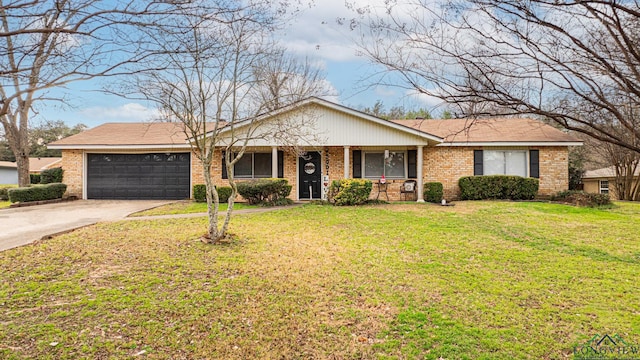 ranch-style house with a garage and a front lawn