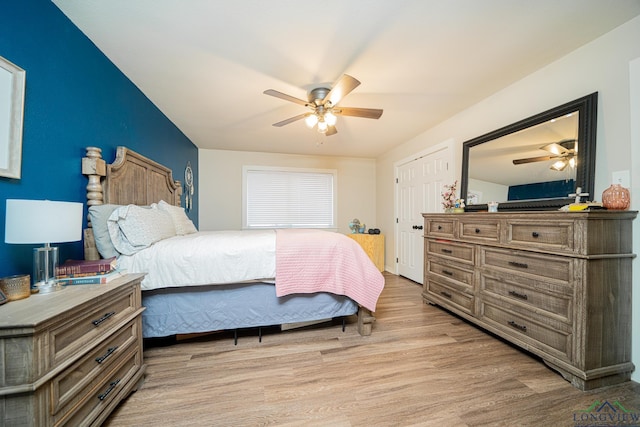 bedroom with ceiling fan and light wood-type flooring