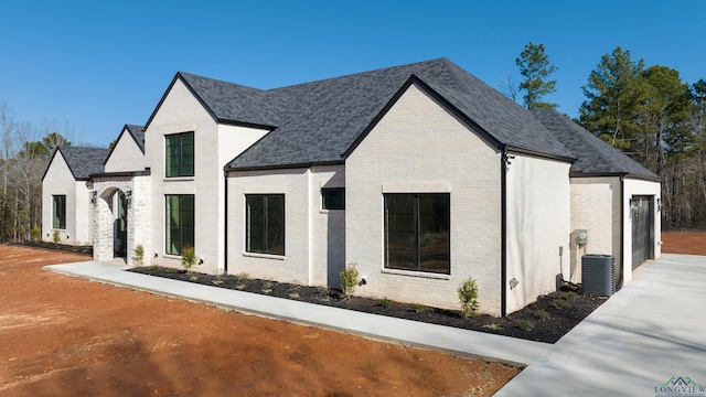 view of front of property with central air condition unit