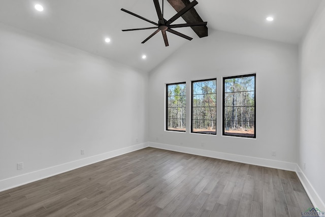 empty room with beamed ceiling, wood-type flooring, high vaulted ceiling, and ceiling fan