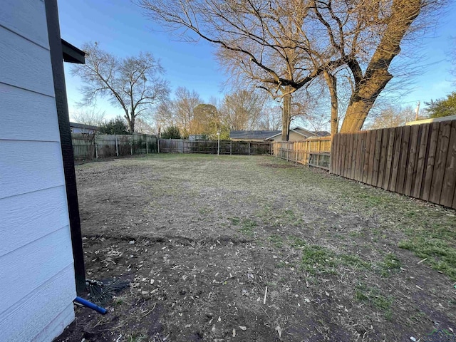 view of yard featuring a fenced backyard