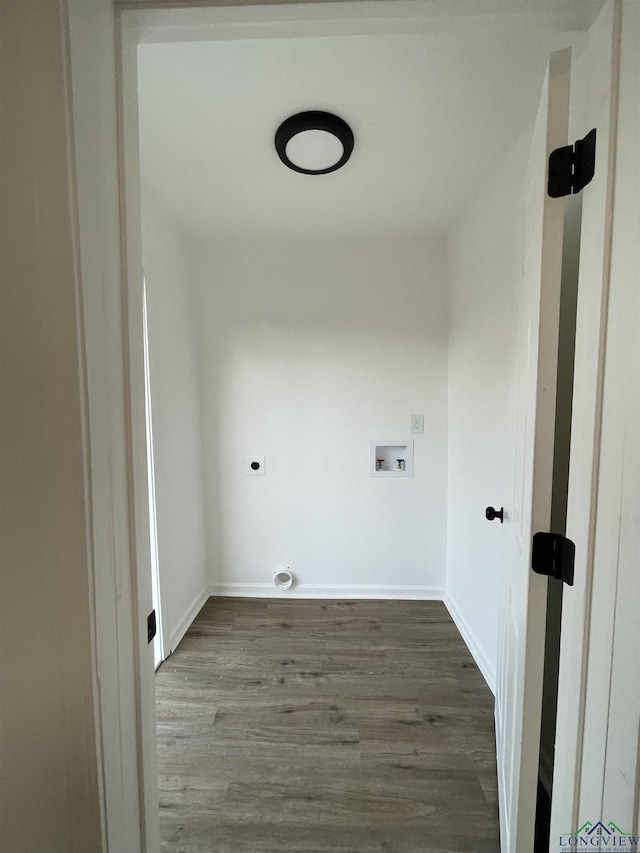 laundry area with dark wood-style floors, hookup for a washing machine, hookup for an electric dryer, laundry area, and baseboards