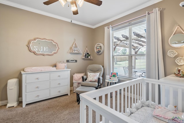 15579 County Road 1104, Flint, TX 75762 - bedroom with a nursery area, multiple windows, light colored carpet, crown molding, and a ceiling fan