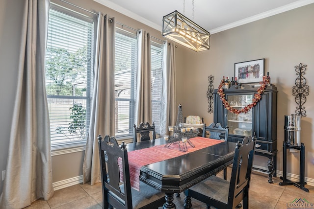 15579 County Road 1104, Flint, TX 75762 - dining area with a chandelier, light tile patterned floors, baseboards, ornamental molding, and plenty of natural light