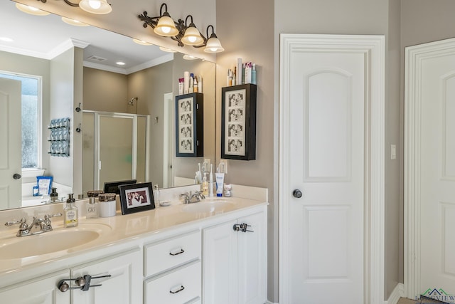 15579 County Road 1104, Flint, TX 75762 - bathroom with a stall shower, double vanity, and crown molding