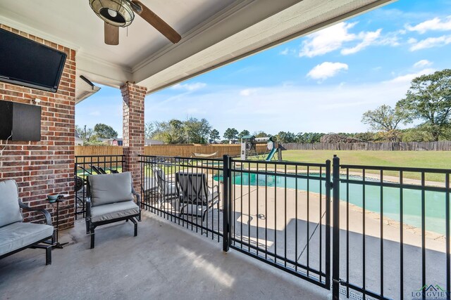 15579 County Road 1104, Flint, TX 75762 - view of patio with a playground and ceiling fan