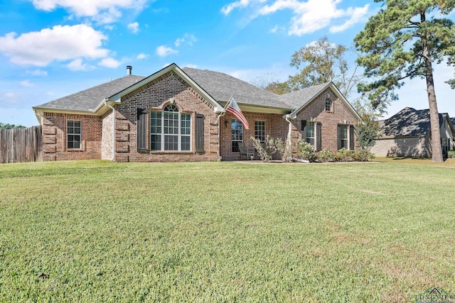 15579 County Road 1104, Flint, TX 75762 - view of front of home with brick siding and a shingled roof