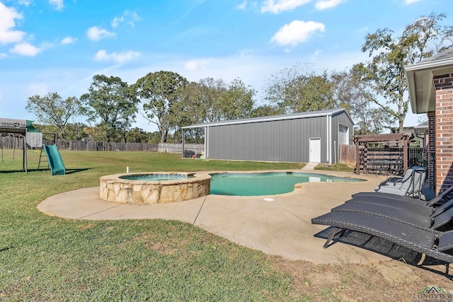 15579 County Road 1104, Flint, TX 75762 - view of pool featuring a patio area, a playground, and a pool with connected hot tub