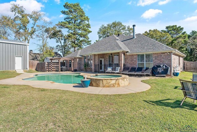15579 County Road 1104, Flint, TX 75762 - view of pool featuring a pool with connected hot tub and a patio