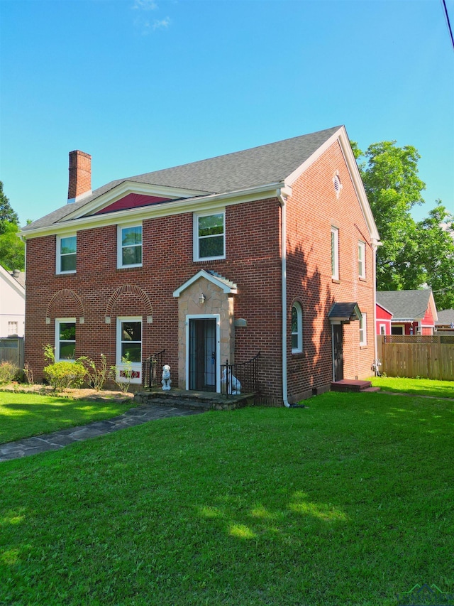 400 Shirley St, Marshall, TX 75670 - view of front of house with a chimney and brick siding