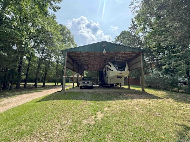226 Almand, Waskom, TX 75692 - view of car parking with driveway and a detached carport
