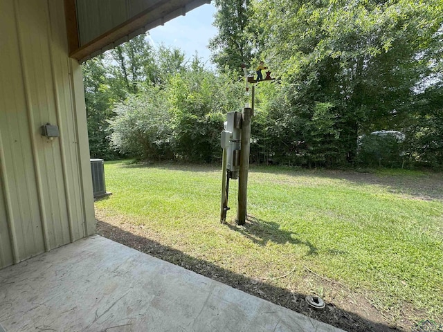 226 Almand, Waskom, TX 75692 - view of grassy yard with a patio area and central AC unit