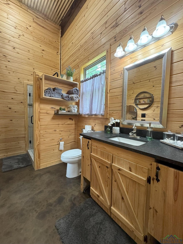 226 Almand, Waskom, TX 75692 - bathroom with wood walls, vanity, and toilet
