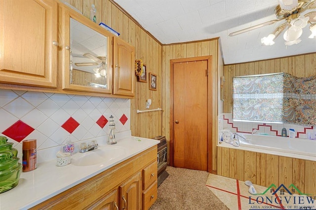 kitchen with ceiling fan and sink