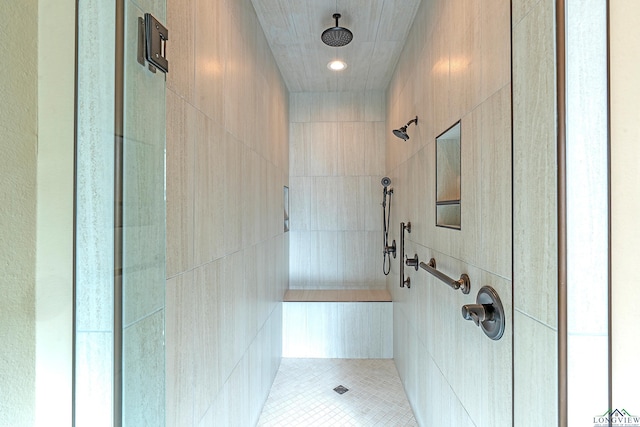 bathroom featuring tiled shower