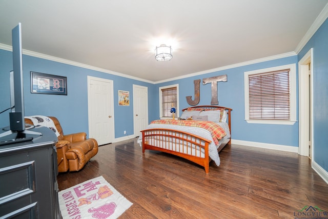 bedroom featuring dark hardwood / wood-style flooring and ornamental molding